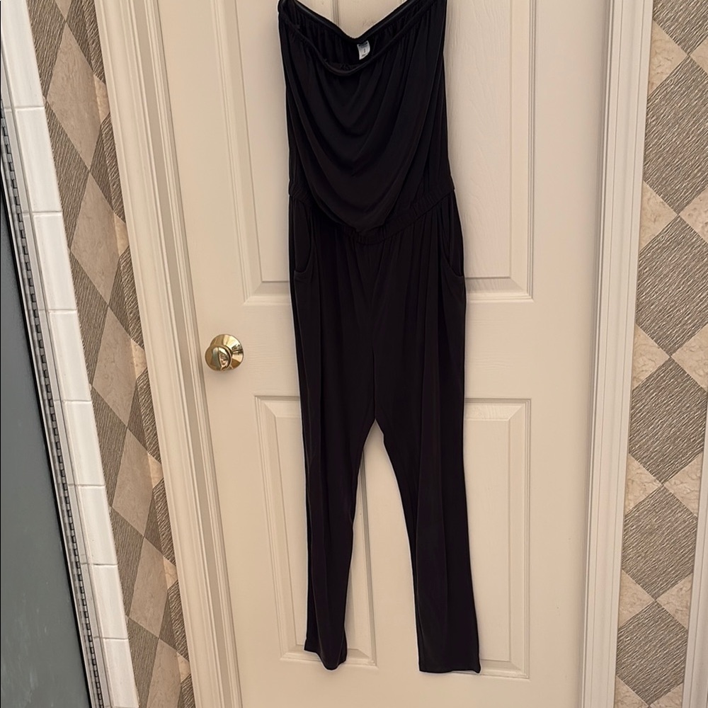 Elegant Black Jumpsuit size small with pockets